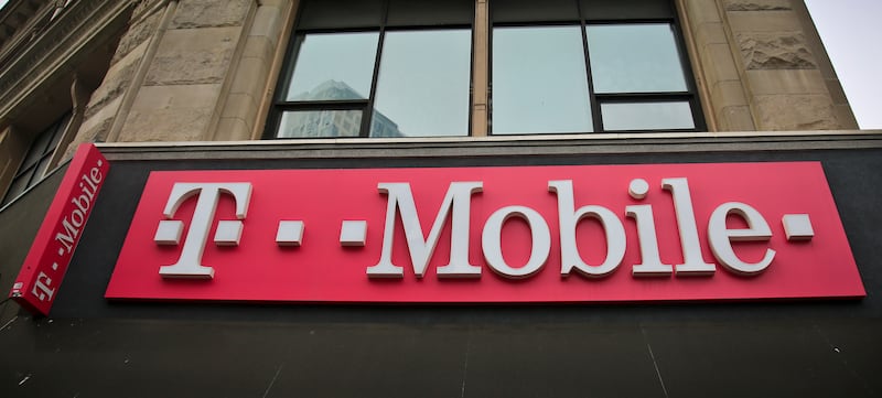 This photo shows signage a T-Mobile store in New York, Monday, April 30, 2018. On Wednesday, March 11, 2020, California’s Attorney General Xavier Becerra said that the state will not appeal a judge’s decision approving the merger of T-Mobile and Sprint.