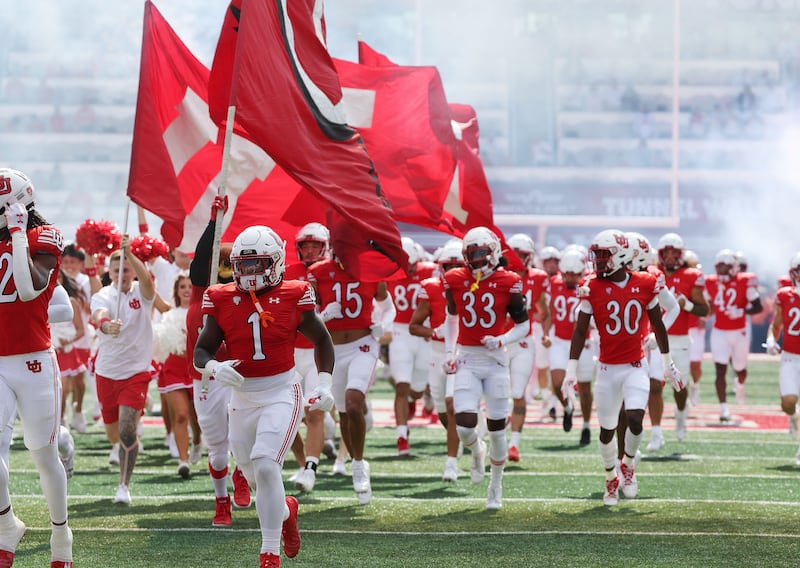 The Utah Utes take the field for a game against UCLA in Salt Lake City on Saturday, Sept. 23, 2023.