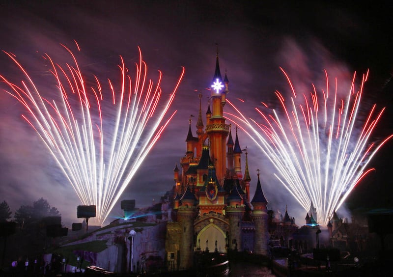 A firework display lights up the castle of Sleeping Beauty in Disneylands theme park in Marne-la-Vallee, east of Paris, Saturday March 31, 2012. This will mark the 20th year since Disneyland opened in Paris in 1992.