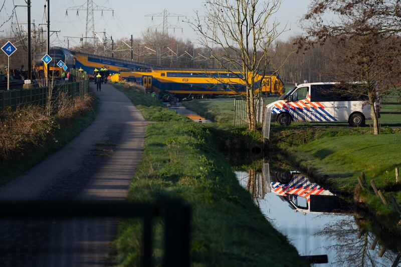 At least one person died and some 30 passengers were injured in the early hours when a train partially derailed, in Voorschoten, near The Hague, Tuesday April 4, 2023, sending at least one carriage into a field next to the tracks