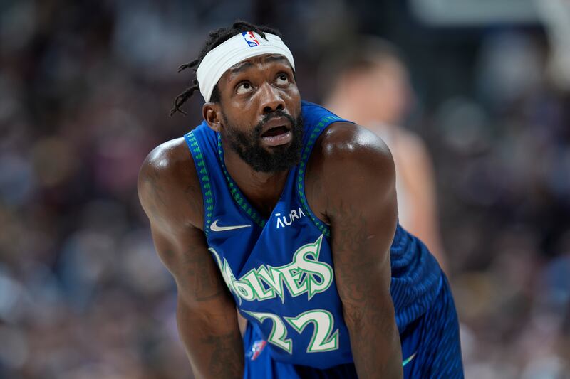 Minnesota Timberwolves guard Patrick Beverley (22) in the second half of an NBA basketball game Friday, April 1, 2022, in Denver. (AP Photo/David Zalubowski)