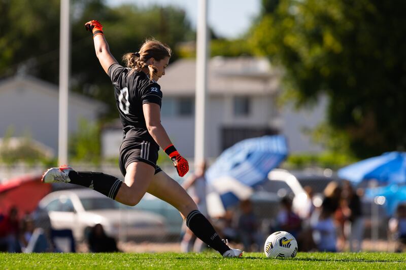 Skyridge High School’s Emalynn Levingston kicks the ball