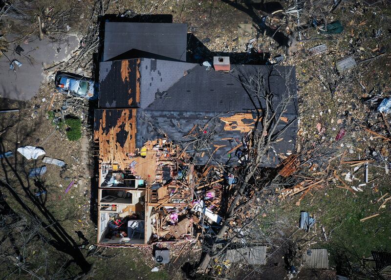 A house is destroyed from a tornado in Covington, Tenn.