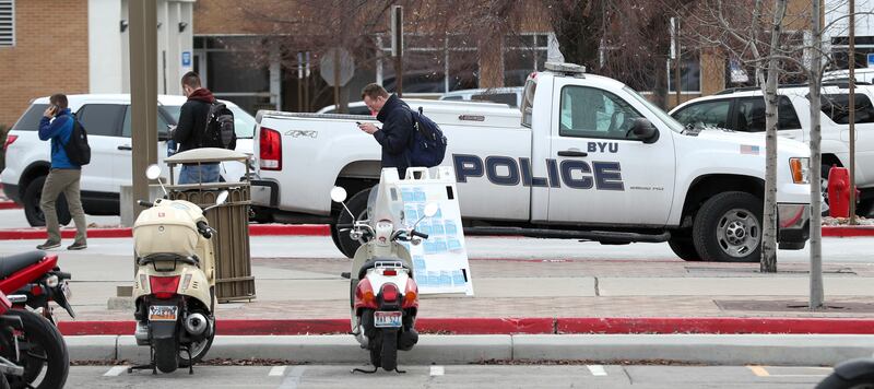 BYU police vehicles are parked outside the department's offices on the BYU campus in Provo on Thursday, Feb. 21, 2019.