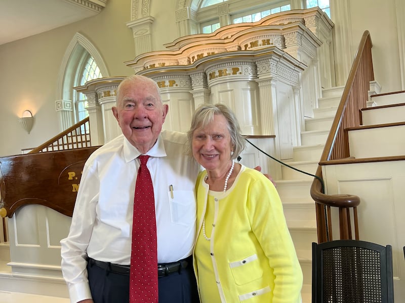 Karl Ricks Anderson, an independent historian and former Church leader in Ohio, and his wife, Joyce Anderson, stand in front of the pulpits in the Kirtland Temple in Kirtland, Ohio, in July 2024.