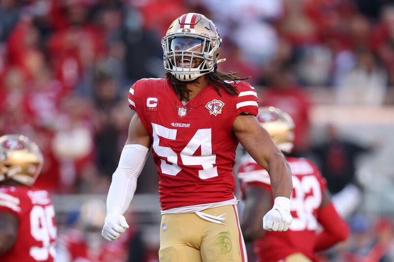 San Francisco 49ers middle linebacker Fred Warner (54) celebrates against the Houston Texans during a game in California.