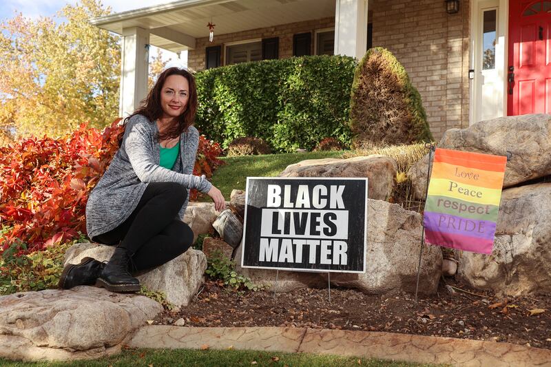 Shauntel Black poses for photos at her Layton home.
