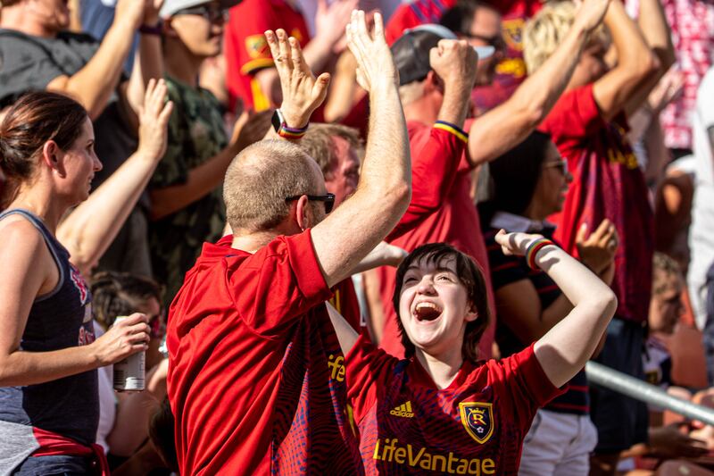 Real Salt Lake fans cheer as RSL and Houston play an MLS soccer game at Rio Tinto Stadium in Sandy on June 26, 2021.