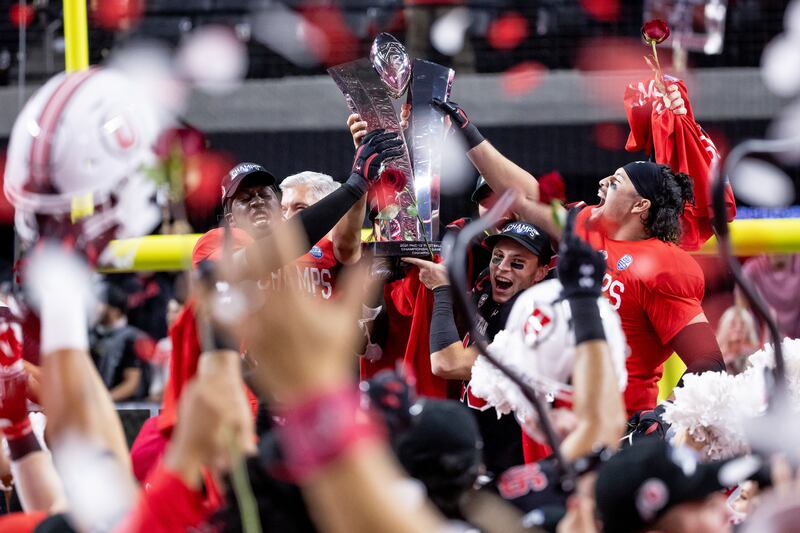 Utah Utes players celebrate after they beat the Oregon Ducks in the Pac-12 championship game.