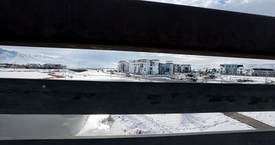 FILE - Construction on condominiums continues in Daybreak on Friday, Feb. 3, 2017.