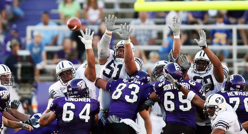 BYU players try to block a field goal against TCU in Fort Worth Texas Sept. 28, 2006.