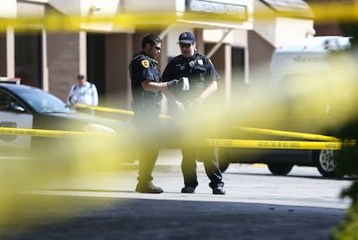 Police investigate a shooting at the Sheraton Hotel in Salt Lake City on Monday, April 8, 2019. A man who apparently opened fire outside the hotel on died after leading police on a chase into South Salt Lake that ended in a crash and a hail of bullets.