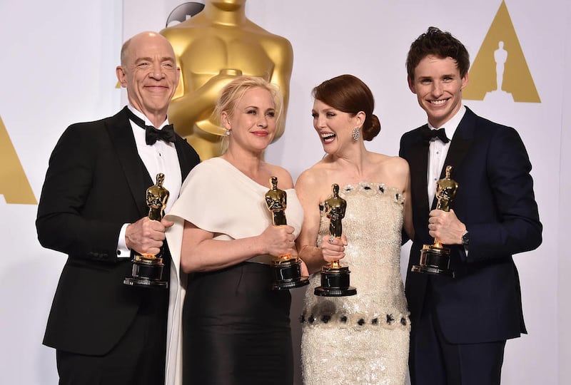 Best Supporting Actor winner J.K. Simmons, Best Supporting Actress winner Patricia Arquette, Best Actress winner Julianne Moore and Best Actor winner Eddie Redmayne pose in the press room at the 87th Academy Awards on Feb. 22, 2015 at the Dolby Theatre in