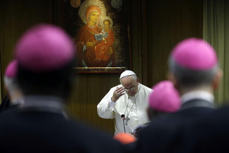 Pope Francis attends a morning session of a two-week synod on family issues at the Vatican, Monday, Oct. 13, 2014.