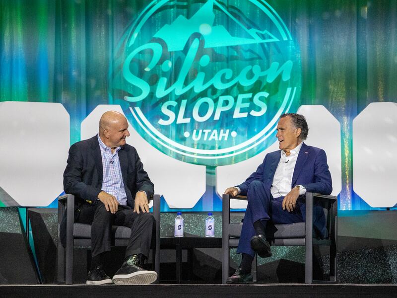Steve Ballmer, LA Clippers owner and former Microsoft CEO, talks with Utah Sen. Mitt Romney at the Silicon Slopes Summit.