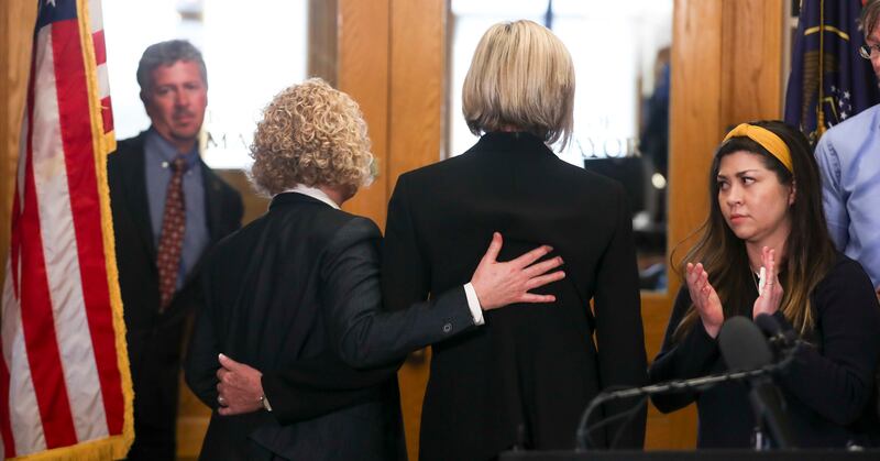 Salt Lake City Mayor Jackie Biskupski, left, returns to her office with her wife, Betty Iverson, after announcing her withdrawal from the mayoral race during a press conference at the City-County Building on Monday, March 18, 2019. Biskupski said the deci
