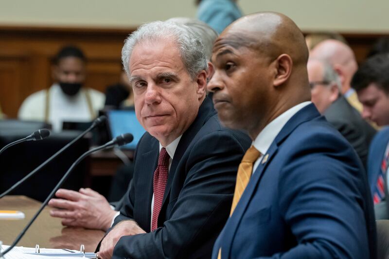 Michael Horowitz, left, who chairs a watchdog panel with oversight of COVID-19 spending, and David Smith, an assistant director of the Office of Investigations at the U.S. Secret Service, testifies in Wednesday, Feb. 1, 2023.
