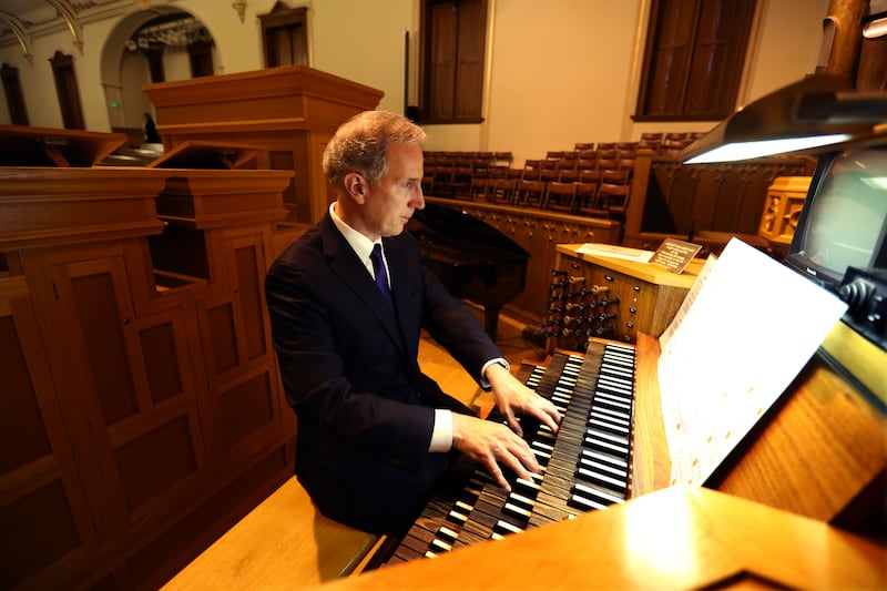 Tabernacle Choir organist Richard Elliott plays the organ in a 2015 file photo.