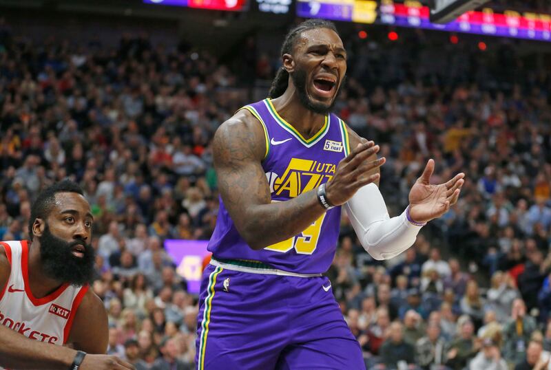 Utah Jazz forward Jae Crowder (99) reacts after being called with for foul, as Houston Rockets guard James Harden, left, watches during the first half of an NBA basketball game Thursday Dec. 6, 2018, in Salt Lake City. (AP Photo/Rick Bowmer)