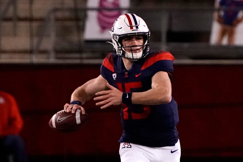 Arizona quarterback Will Plummer (15) plays in an NCAA college football game against Arizona State, Dec. 11, 2020.