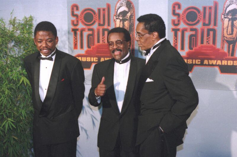 FILE - In a March 13, 2012 file photo, Soul Train founder and Sout Train Awards producer Don Cornelius, right, appears backstage with attorney Johnny Cochran, center, at the ninth annual Soul Train Music Awards in Los Angeles. Defense attorney Carl Dougla