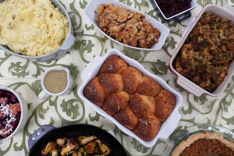 Overview of Thanksgiving sides from Vessel Kitchen including rolls, gravy, mashed potatoes, stuffing and more.