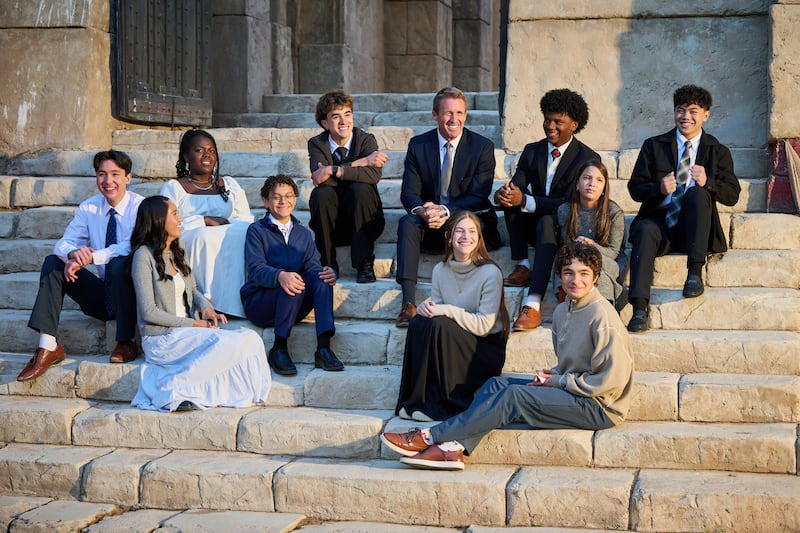Young Men General President Timothy L. Farnes speaks with youth during the Jan. 18, 2026, worldwide discussion for youth on the Jerusalem set in Goshen, Utah.
