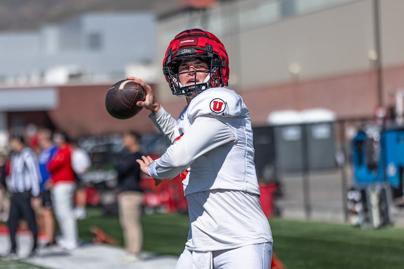 Utah quarterback Brandon Rose prepares to throw during 2024 spring camp. Rose and incoming freshman Isaac Wilson are competing for QB2 duties.