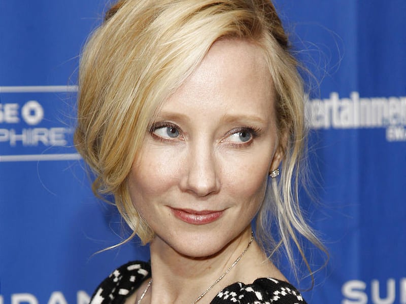 Actress Anne Heche poses at the premiere of “Cedar Rapids” during the 2011 Sundance Film Festival in Park City, Utah on Sunday, Jan. 23, 2011.