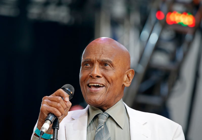 Singer and activist Harry Belafonte speaks during a memorial tribute concert for Pete Seeger in New York.