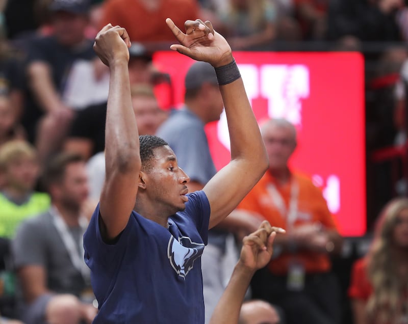 Memphis Grizzlies forward Jaren Jackson Jr. cheers teammates during the NBA Utah Jazz summer league in Salt Lake City on Thursday, July 5, 2018.