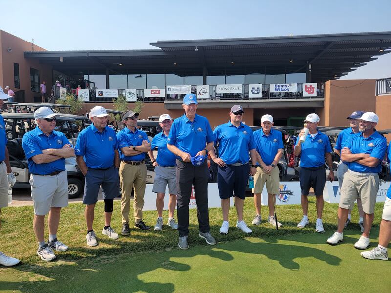 Former BYU football star Gifford Nielsen, center, talks during the Friendship Cup, a Ryder Cup-style event at Sand Hallow Resort in Hurricane, Utah.