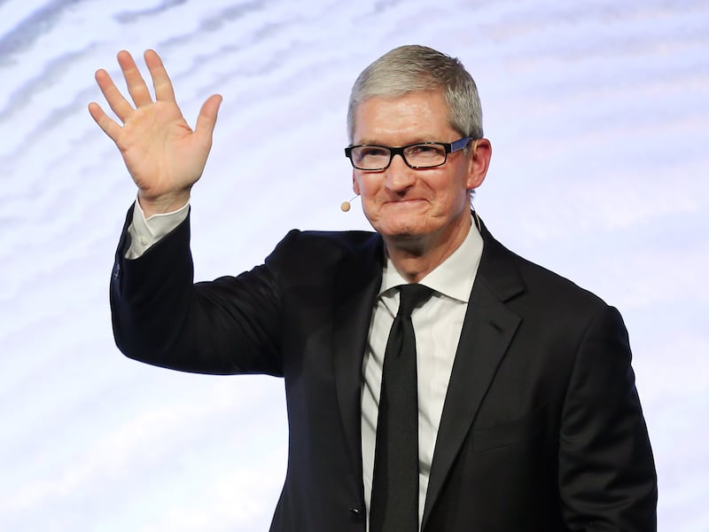 Apple CEO Tim Cook waves to the crowd during a question-and-answer session with members of the Utah tech community in 2016.