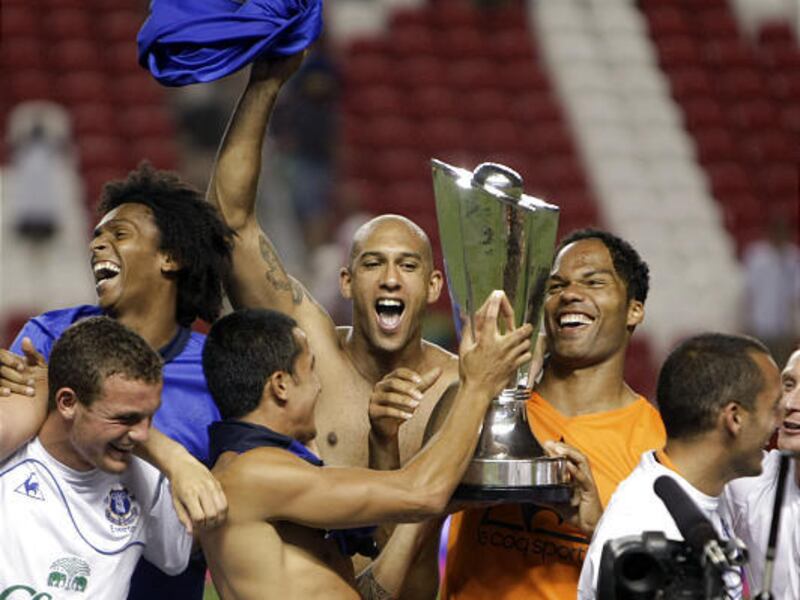England's Everton FC celebrates with the MLS All-Star game trophy after beating the MLS All-Stars.