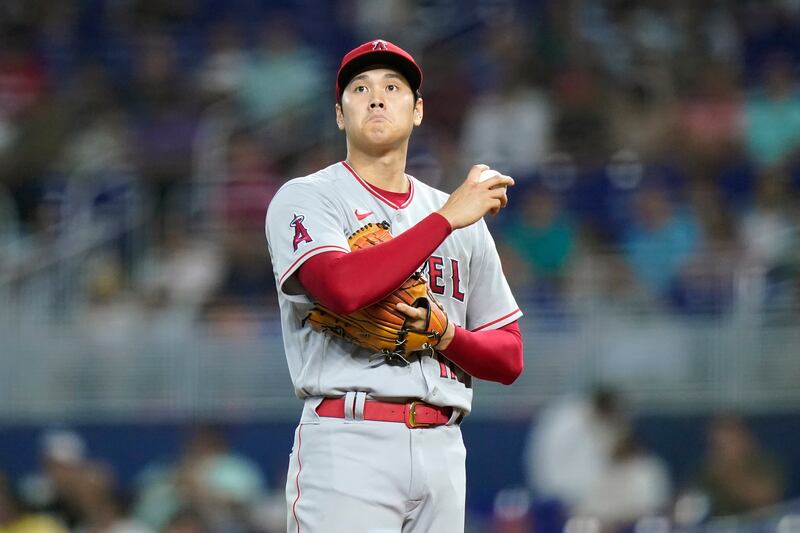 Los Angeles Angels starting pitcher Shohei Ohtani stands on the. Mound during the first inning of a baseball game against the Miami Marlins, Wednesday, July 6, 2022, in Miami. (AP Photo/Lynne Sladky)