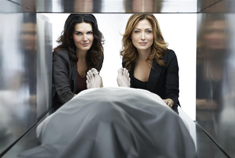 Angie Harmon, left, and Sasha Alexander star in the new TNT series "Rizolli & Isles."