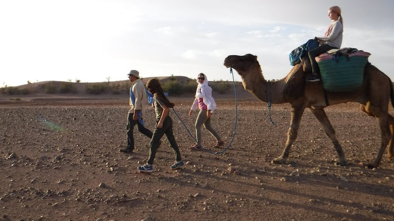 In their year of travel, the Wozny family visited 24 countries, including the desert of Ouarzazate, Morocco.