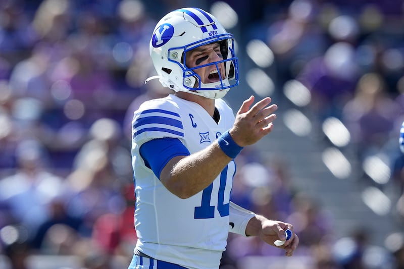 BYU quarterback Kedon Slovis (10) yells before playing from the line of scrimmage during the first half of an NCAA college football game against TCU, Saturday, Oct. 14, 2023, in Fort Worth, Texas.