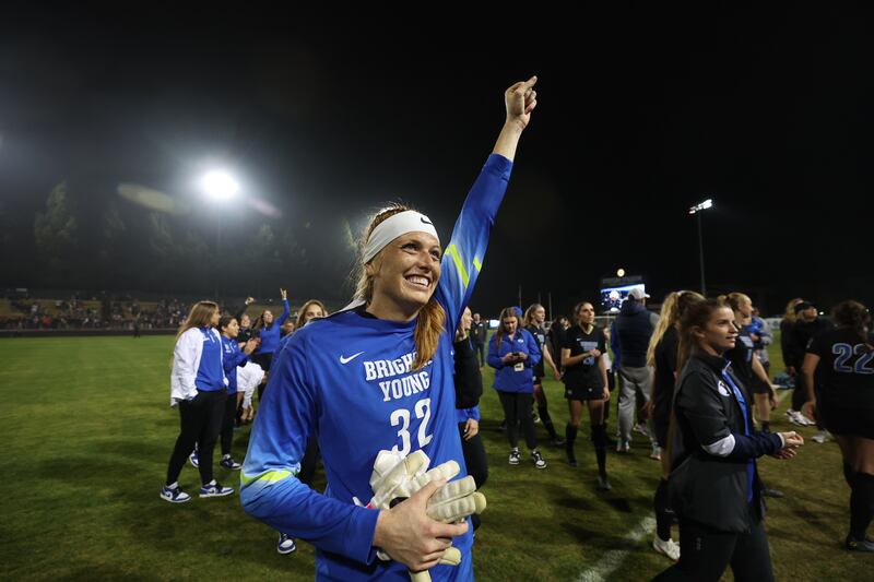 BYU goalkeeper Cassidy Smith (32) celebrates after the Cougars beat Santa Clara 3-2 in a penalty kick shootout during the NCAA women’s soccer tournament semifinals.