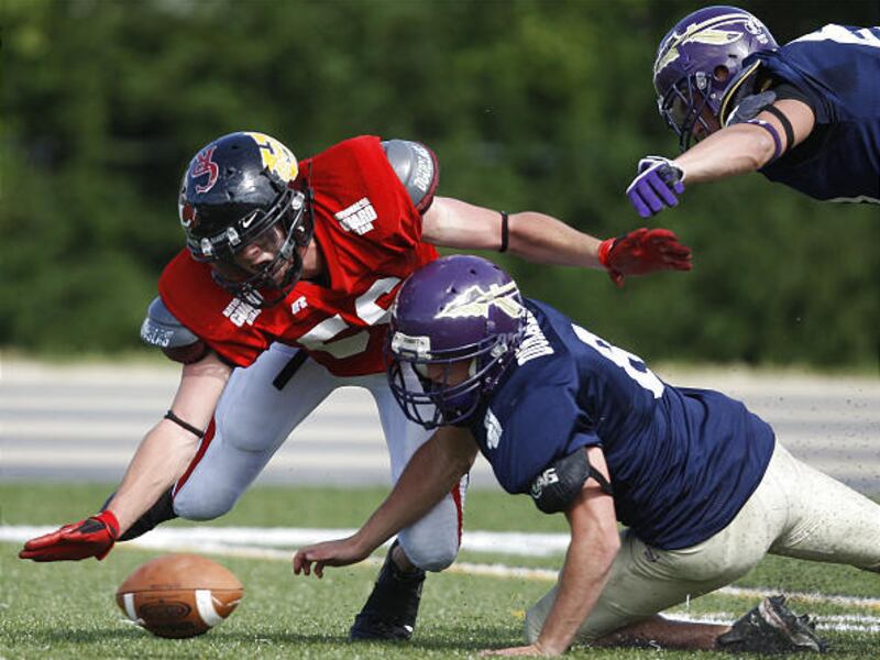 Park City's Blake Henrie falls on a fumble from North Summit's Dallin Donaldson during the 1A/2A vs. 3A All Star game Saturday.