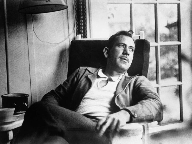 American author John Steinbeck, takes a rest from intense work on a new novel in an undated photo.