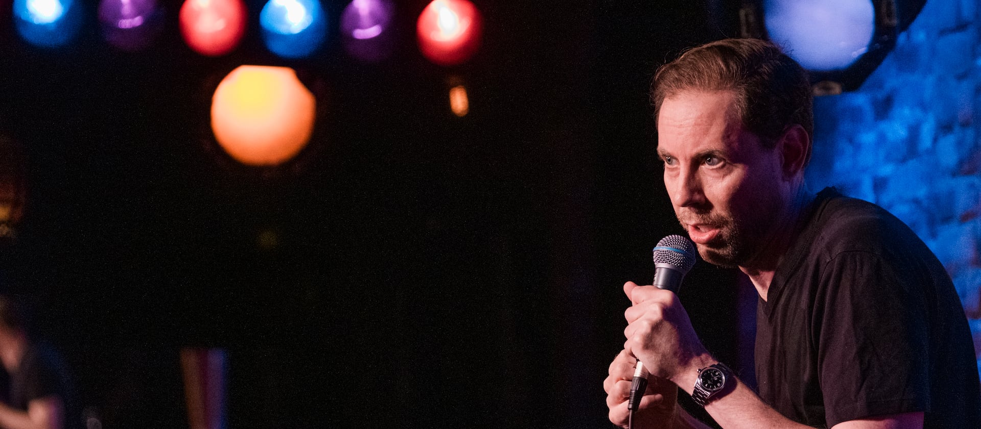 Comedian Ryan Hamilton performs at the Village Underground in Manhattan, New York in 2023.