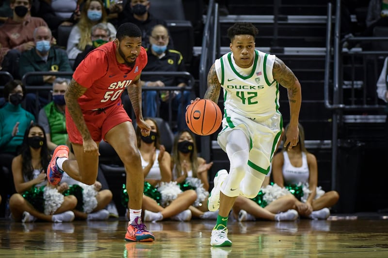 Oregon guard Jacob Young (42) brings the ball up during game against SMU Friday, Nov. 12, 2021, in Eugene, Ore.