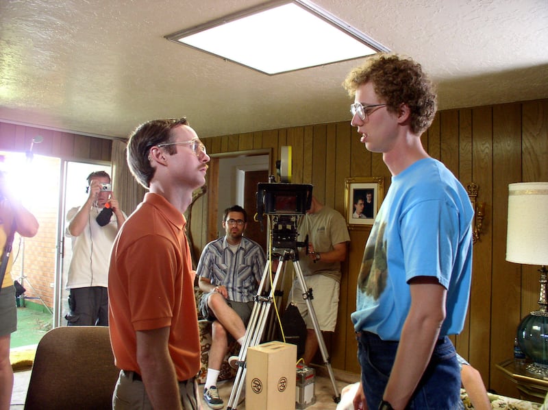 Aaron Ruell, from left, Jared Hess and Jon Heder on set during filming for "Napoleon Dynamite."