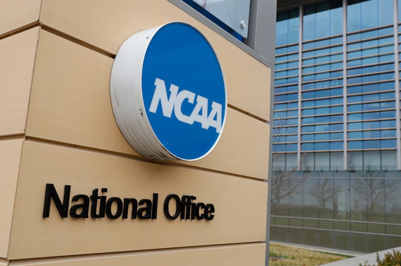 Signage at the headquarters of the NCAA is viewed in Indianapolis, March 12, 2020.