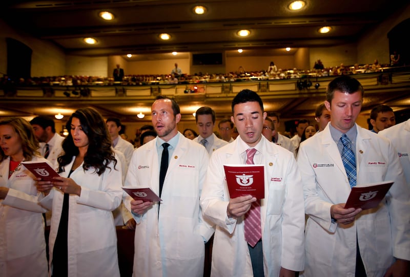 Medical students recite the Hippocratic oath after the White Coat Ceremony at the University of Utah on Aug. 28, 2015.