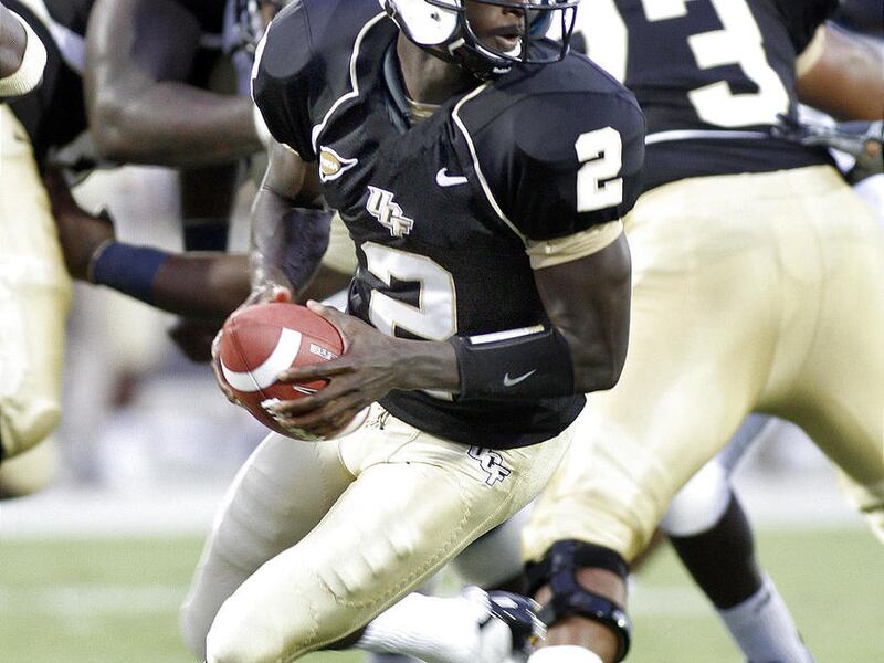 UCF quarterback Jeff Godfrey (2) was sacked six times and fumbled in a loss to FIU last week, but is still a mobile threat.