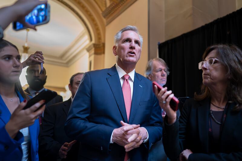 House Speaker Kevin McCarthy, R-Calif., walks with reporters after votes in the House, at the Capitol in Washington, Thursday, June 22, 2023.