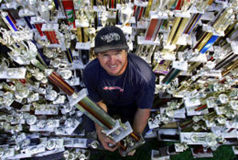 Mike Poulson has won hundreds of trophies through the years from bicycle motocross events.
