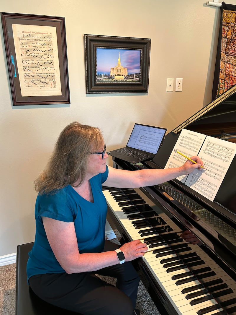 Delys Waite Snyder composes music at her piano in Salem, Utah, May 15, 2026.